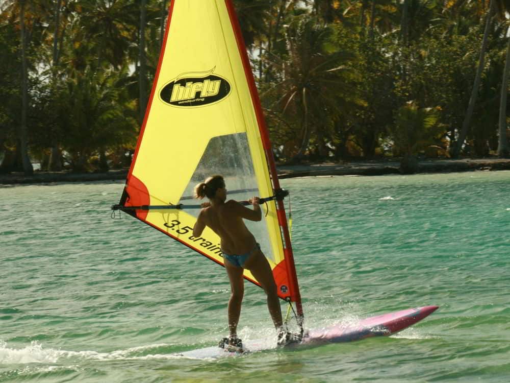 windsurfing around your private island in Tahiti