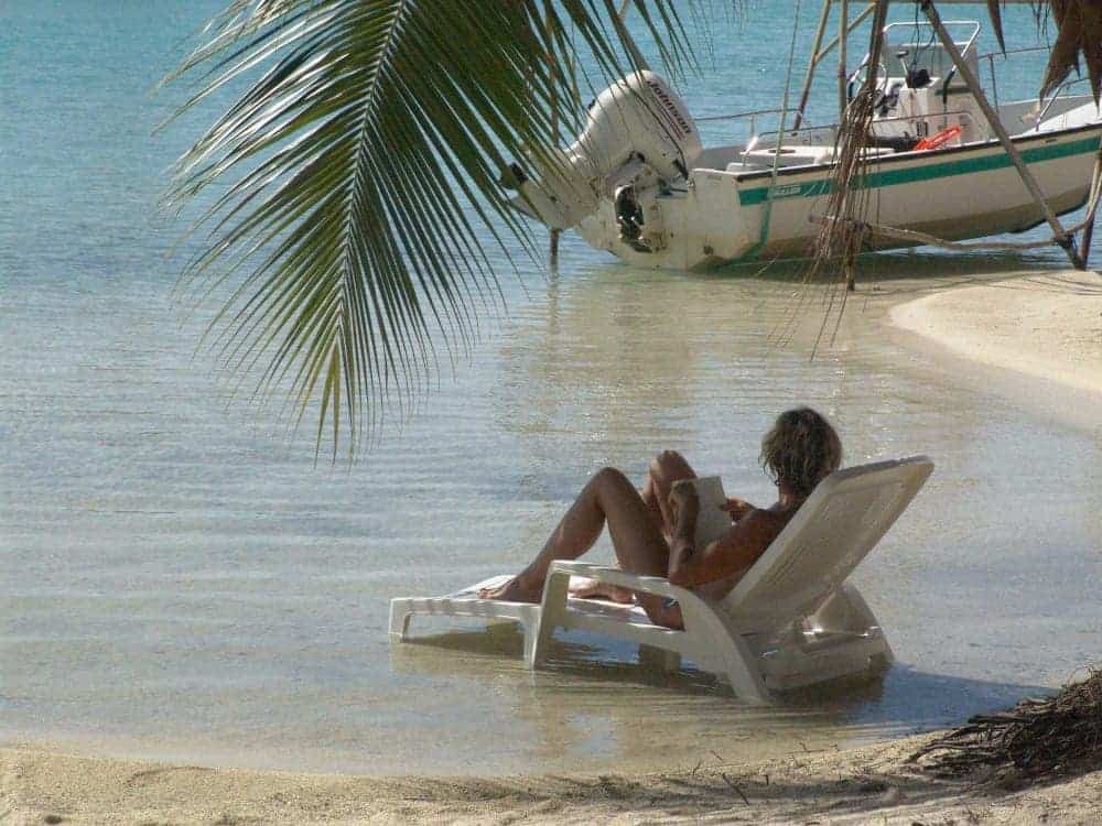 Relaxing on Motu Moie private island, clothing optional